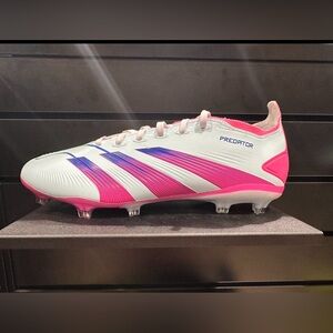 Nike cleats , woman’s new in box, size 8